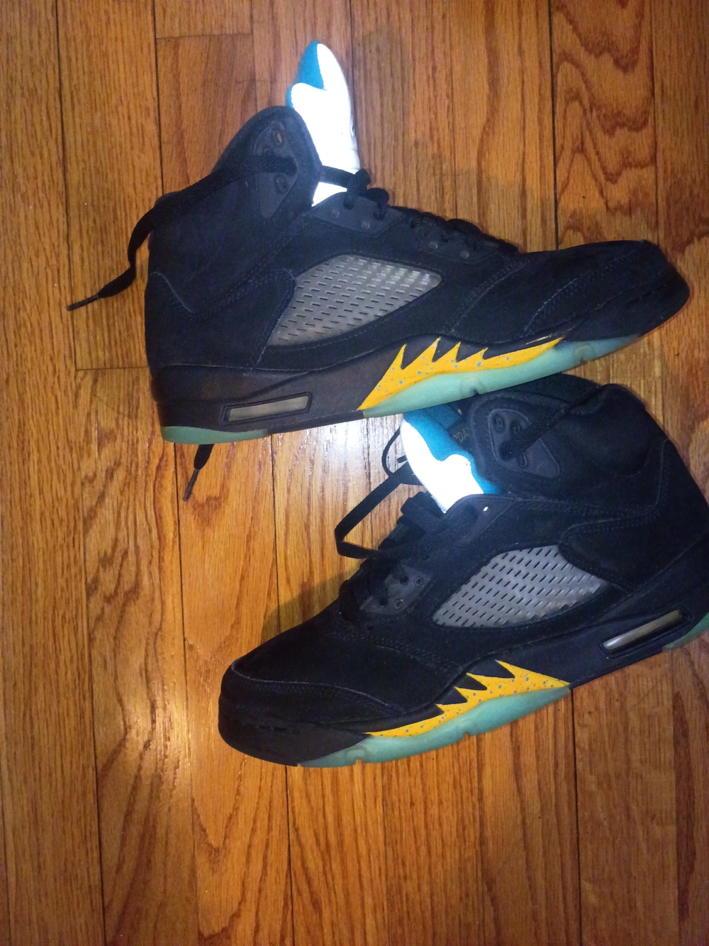 Jordan Men’s Black High-Top Sneakers with Yellow and Teal Accents